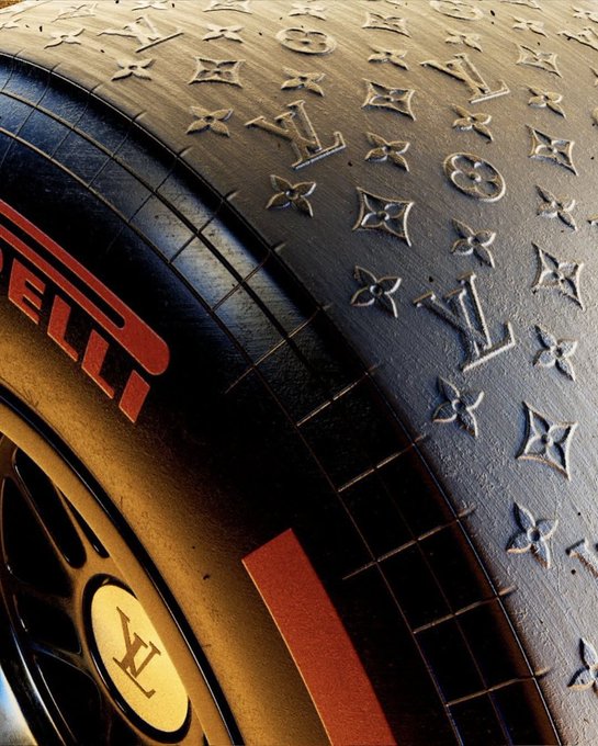 A close-up detail of a tire showing a Louis Vuitton monogram pattern molded into the rubber, with red 'Pirelli' branding visible.
