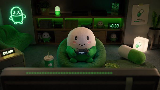 The image features a cartoon character sitting in a chair, holding a game controller with a smile on its face. There are several other cartoon characters scattered around the room, including one near the top left corner of the frame and another at the bottom right corner. The scene is set against a backdrop that includes a TV screen displaying an advertisement for a product or service, as well as a clock in the background.
