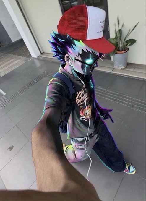 An edited photograph shows a person taking a selfie while kneeling on a tiled floor, wearing a red and white trucker hat, a colorful oversized hoodie with 'Dare to be different' text, and featuring a stylized, anime-like filter with glowing blue eyes.