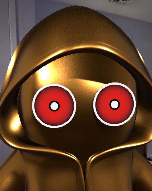 A 3D-rendered golden hooded figure with glowing red circular eyes, appearing like a mysterious character statue.