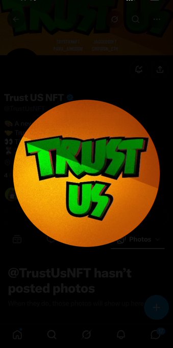 A Twitter/X profile page for 'Trust US NFT' (@TrustUsNFT) showing a large circular orange logo with green 'TRUST US' graffiti-style text across it.