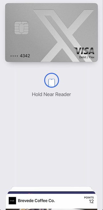 A sleek gray Visa Debit/Flex card with an embossed "X" design and ending in 4342 is displayed on an Apple Pay screen prompting users to "Hold Near Reader," with a "Brevede Coffee Co." loyalty card showing 12 points below—fittingly matching the post's compliment that "The X pay card Looks Sexy."