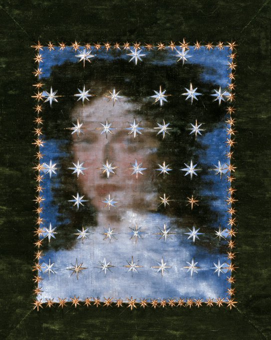 A blurred, obscured portrait of a person surrounded by a decorative border of painted or printed stars on a dark green velvet-like background.