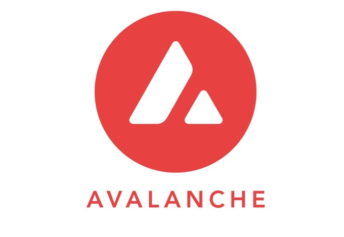 The image displays the Avalanche (AVAX) logo, featuring a stylized white "A" formed by geometric triangle shapes inside a red circle, with the word "AVALANCHE" printed below. This branding directly corresponds to the accompanying news about the blockchain network's record decentralized exchange trading volume of $3.75 billion in September.