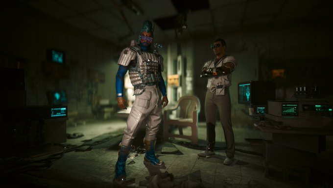 In a dimly lit cyberpunk clinic filled with old computer monitors and equipment, a blue-skinned client with cybernetic implants stands before a "RIPPERDOC" sign while a doctor wearing a "RIPPERDOC" lanyard prepares to perform modifications. The scene captures the gritty atmosphere of underground cybernetic surgery in a post-apocalyptic setting.