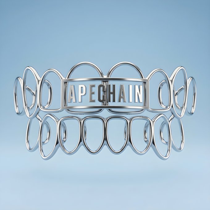 A silver chrome bracelet/necklace displaying the text 'APECHAIN' in a rectangular centerpiece against a light blue background.