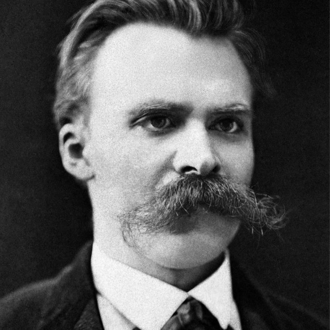 The image features a man with a mustache wearing a suit and tie, which suggests that he might be attending an important event or occasion. The black and white color scheme of the photo adds a timeless quality to the scene. The caption "True of every disruptive blockchain (e.g., Zcash, Starknet)" implies that the image is related to the concept of disruption in the context of blockchain technology. This could potentially be a reference to Bitcoin or other blockchain-based projects, where disruptive innovations are driving change and transforming industries.