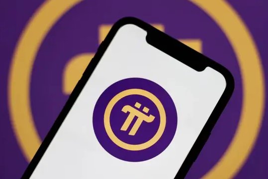 A smartphone displays the Pi cryptocurrency logo, with the iconic purple and gold branding visible both on the device and enlarged in the background, visually reinforcing the Pi Network announcement about new integrations on Pi Desktop.