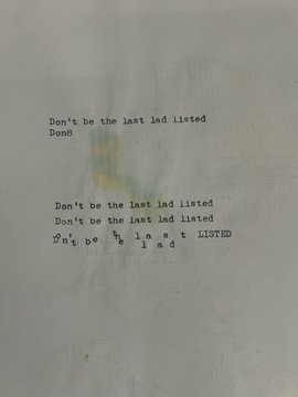 The image shows a piece of paper with typewritten text reading "Don't be the last lad listed / Dont" and below it the same phrase "Don't be the last lad listed" repeated, with the final version using individually spaced letters. The repeated "last lad listed" warning plays on the "Mad Lads" NFT collection name mentioned in the post, referencing the urgency of not being among the last to mint or be listed.