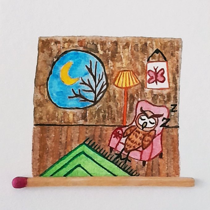 A charming hand-painted illustration on corrugated cardboard shows a sleeping owl in a pink armchair, with a crescent moon, lamp, and butterfly picture in the background, with "zzz" indicating slumber. The artwork, displayed with a pink-tipped matchstick, accompanies a post wishing "Good night" as part of an NFT collection on objkt.com.