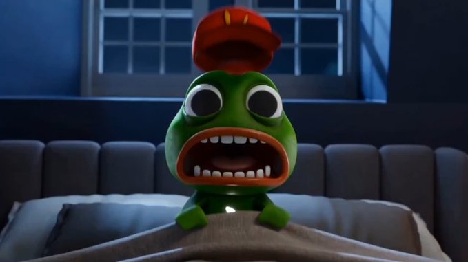 A green animated frog-like creature with a wide-open mouth showing teeth and a red cap sits in a bed with white sheets, with a window in the dark background.