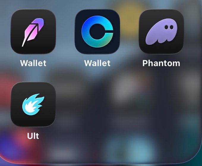 Screenshot of a smartphone home screen displaying four app icons labeled 'Wallet', 'Wallet', 'Phantom', and 'Ult' on a dark background.