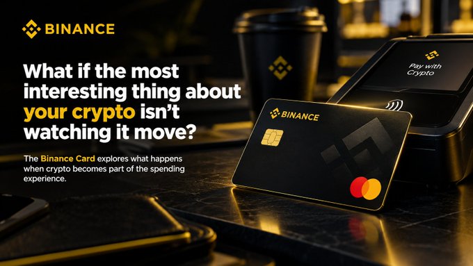 A Binance promotional advertisement featuring a black Binance Card next to a payment terminal, with the tagline 'What if the most interesting thing about your crypto isn't watching it move?'