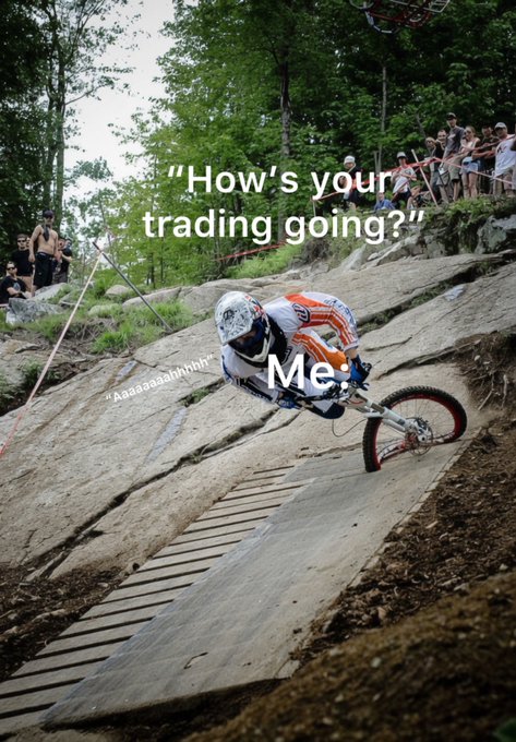 Mountain biker descending a steep rocky trail with overlaid meme text 'How's your trading going?' directed at 'Me.', while spectators watch from the sidelines.