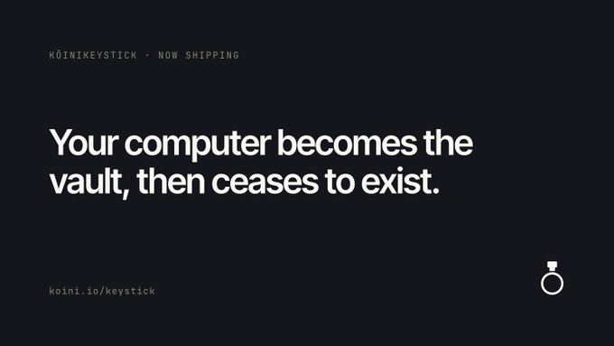 A dark promotional advertisement reading 'KOINIKEYSTICK - NOW SHIPPING' with the tagline 'Your computer becomes the vault, then ceases to exist.' and the URL 'koini.io/keystick' displayed.