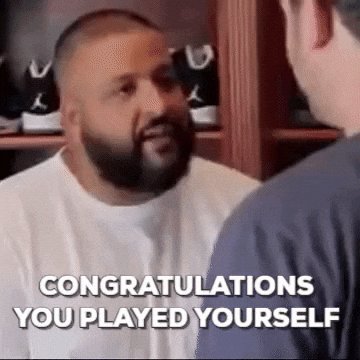 The image features a man with a beard wearing a white shirt sitting next to another person who appears to be a male. The text "Congratulations You Played Yourself" is written above them, which seems to be a humorous response to someone's attempt at promoting XRP. This could be interpreted as an ironic or satirical commentary on the current state of XRP and its promotion by others.