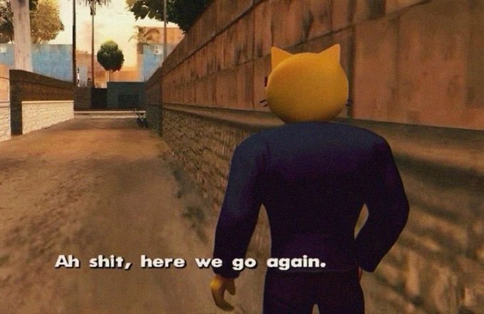 A screenshot from a video game showing a character with a yellow cat head wearing a dark suit walking down an alleyway, with the caption 'Ah shit, here we go again.'