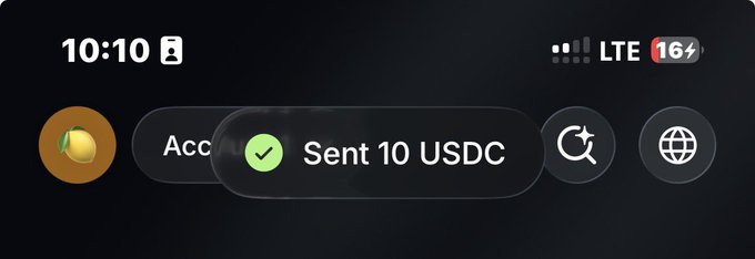 A smartphone status bar at 10:10 with 16% battery displays a dynamic island notification confirming "Sent 10 USDC," verifying a $10 USDC cryptocurrency transaction sent to the user.