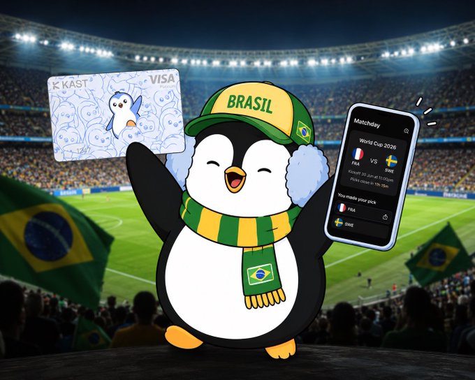 A cartoon penguin wearing a Brazil soccer hat and scarf, holding a KKAST Visa card and a phone displaying a 2026 World Cup match between France (FRA) and Sweden (SWE), set against a stadium backdrop.