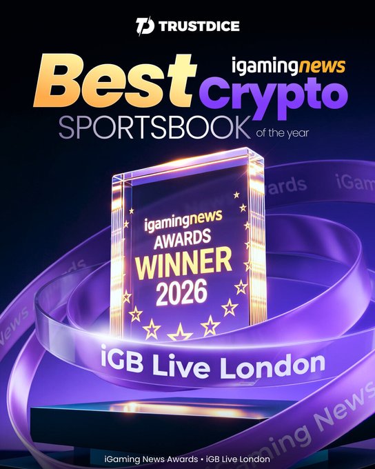 An advertisement for 'TRUSTDICE' winning 'Best Crypto Sportsbook of the year' at the igamingnews AWARDS WINNER 2026, held at iGB Live London, featuring a glowing award trophy.