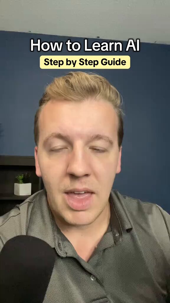 The image shows a man wearing a grey shirt holding a microphone with his mouth open, as if he's speaking or recording something. The caption below the image reads "How to Learn AI Step by Step Guide", which suggests that there might be an AI learning guide available for free on the internet. However, it is important to note that access does not create knowledge; rather, it requires active engagement and application of the learned concepts.