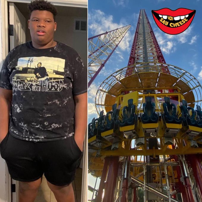 A side-by-side meme image featuring a young man in a black "Boyz n the Hood" tie-dye shirt on the left and a tall amusement park drop tower ride on the right, with a "SAY CHEESE" sticker in the corner.