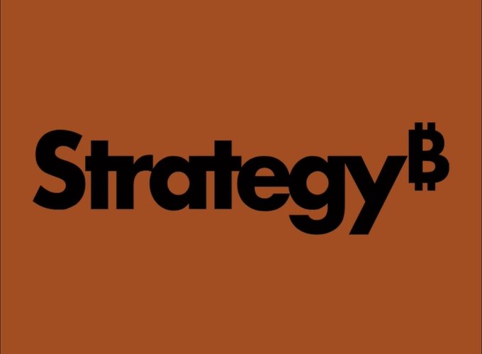 The image displays the word "Strategy" in bold black text on an orange background, with a Bitcoin symbol (₿) as the superscript. This visually represents the post's sentiment about Strategy (formerly MicroStrategy) and its deep connection to Bitcoin, suggesting the company is fundamentally a Bitcoin-focused entity.