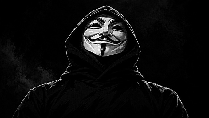 A black and white image of a person wearing a Guy Fawkes mask and a dark hooded cloak.