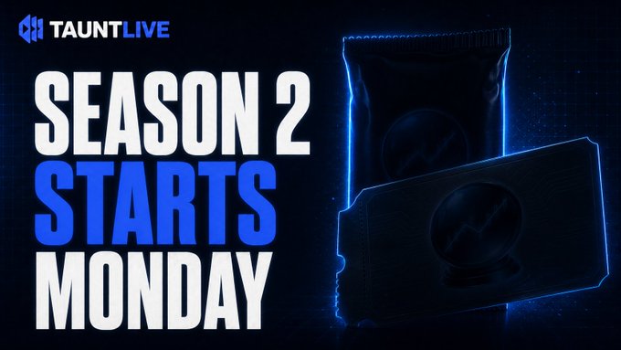 A dark blue promotional banner for 'TAUNTLIVE' announcing 'SEASON 2 STARTS MONDAY' next to stylized, glowing card sleeves.