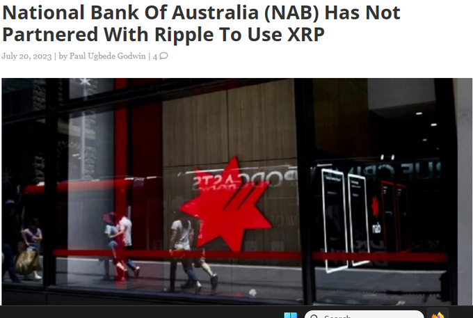 A news article headline reading 'National Bank Of Australia (NAB) Has Not Partnered With Ripple To Use XRP' dated July 20, 2023 by Paul Ugbede Godwin, accompanied by an image of the National Bank of Australia building with its red star logo reflected in the window.