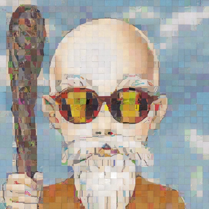 A pixelated mosaic portrait of a bald, bearded martial artist wearing sunglasses, constructed from small colorful tiles resembling a video game sprite, fittingly depicted in blocky 8-bit style for "the machine." The tribute honors Master Roshi (the Turtle Hermit) from Dragon Ball, with visible text fragments like "NEW YEAR," "CAUTION," and various store/brand names woven into the tiled background.