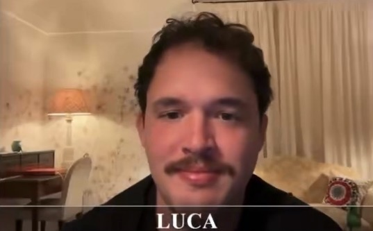 The image shows a man with a mustache, labeled "LUCA" at the bottom, appearing in what looks like a video stream or interview setting with warm lighting and curtains in the background, likely representing Luca Netz as referenced in the accompanying post about the Market Bubble stream discussion.