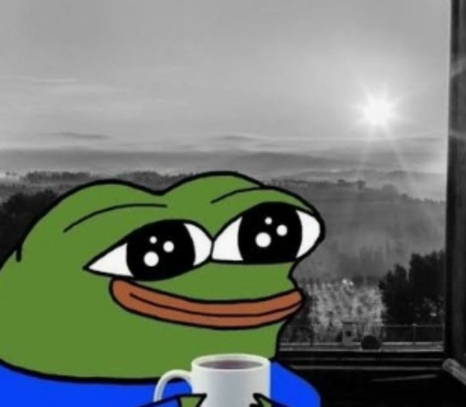 A sad Pepe the Frog meme holding a white coffee mug in front of a window with a snowy, monochromatic landscape outside.