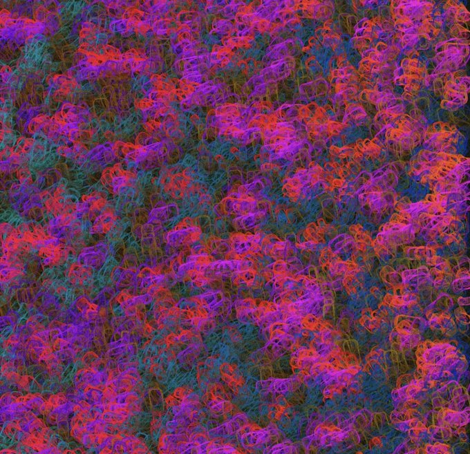 An abstract swirling pattern of vibrant magenta, red, and teal looping shapes creating a textured, chaotic visual effect.