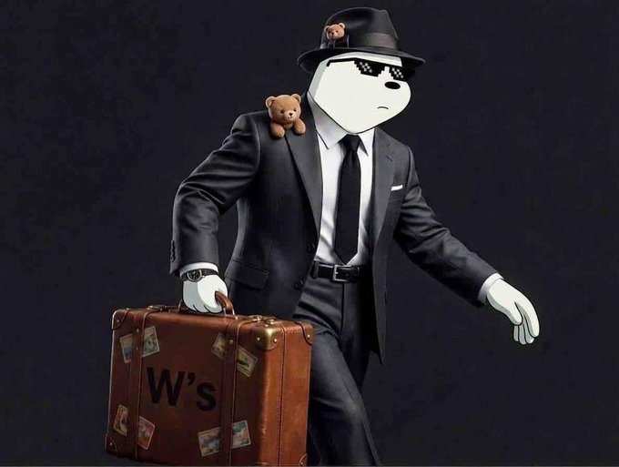 The image features a man dressed in a suit and tie with sunglasses, holding a suitcase that has "W's" written on it. The suitcase appears to be brown and has several stickers on it. The background of the image is black, which contrasts with the white text on the suitcase. There are no other objects or people visible in the image.