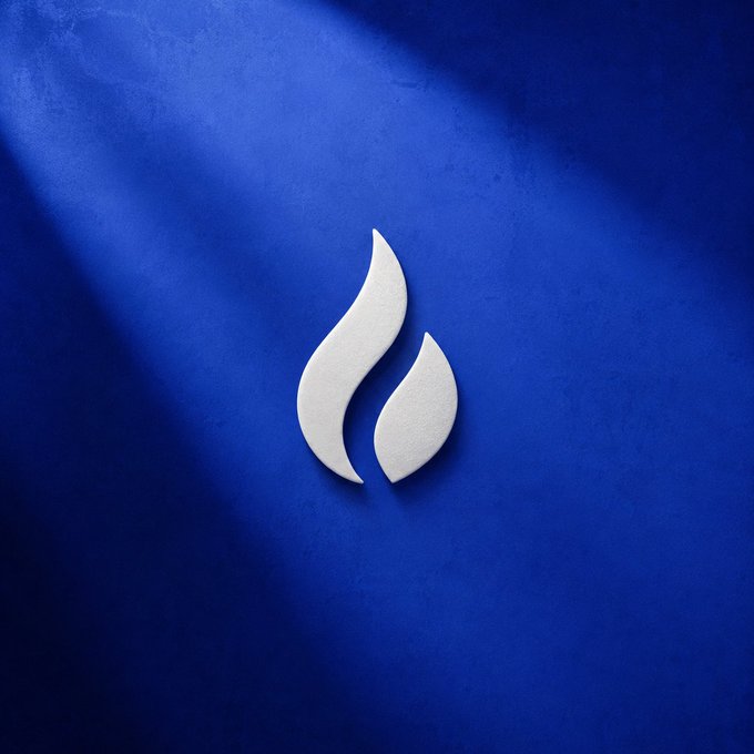 A minimalist white flame or teardrop logo centered on a deep blue textured background.