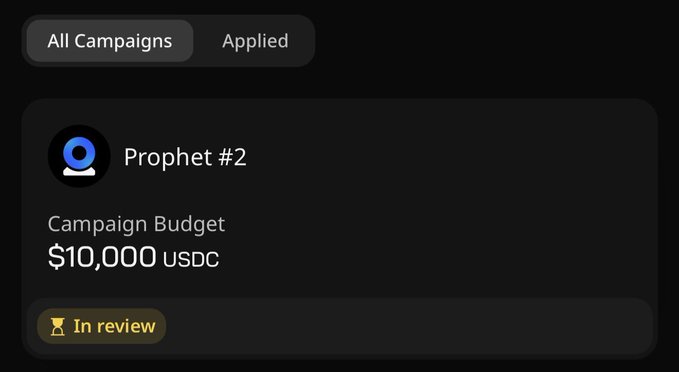 A dark-themed interface showing a campaign titled 'Prophet #2' with a budget of $10,000 USDC and a status indicator marked 'In review'.
