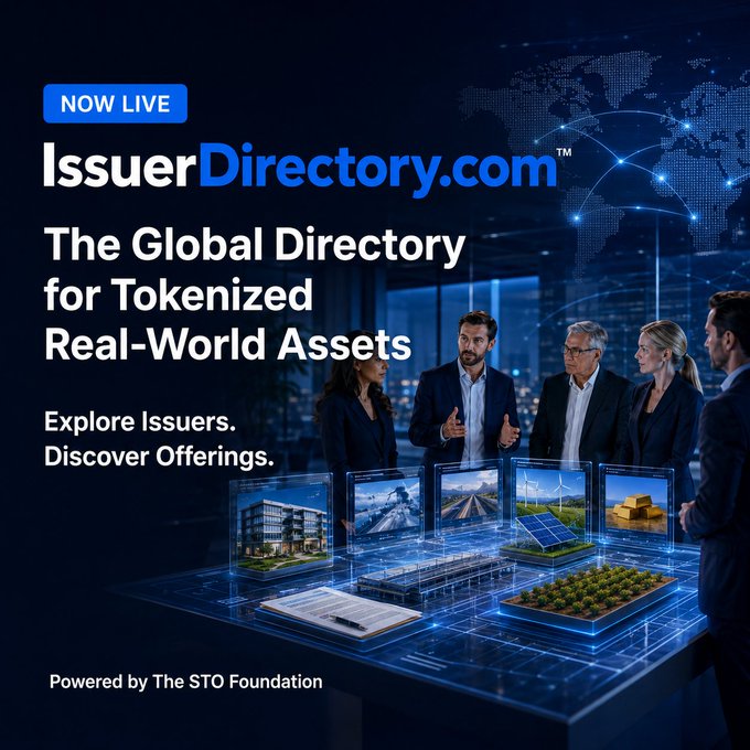 A promotional banner for IssuerDirectory.com, branded as "The Global Directory for Tokenized Real-World Assets," features business professionals examining a futuristic holographic display showcasing various tokenized assets (real estate, solar panels, farmland, and gold bars). Marked "NOW LIVE" and "Powered by The STO Foundation," the image visually represents the launch of a new platform connecting investors and professionals with issuers in the tokenized real-world asset market.