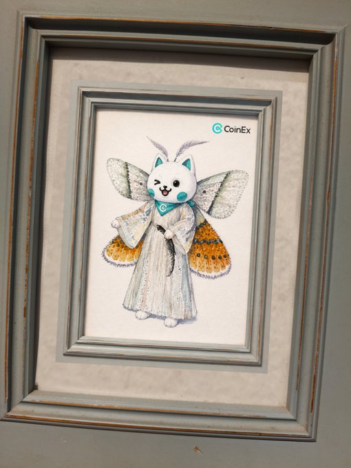 A framed watercolor painting of a white cat-like character dressed as a fairy with orange-patterned butterfly wings, holding a wand, with the "CoinEx" logo visible in the upper right corner.