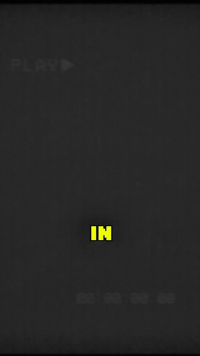 The image features a black square with yellow text that reads "IN". The background of the image is dark gray or black, which contrasts with the bright yellow text. There are no other objects or texts present in the image.