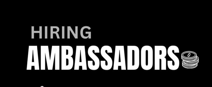 Bold white text on a black background reads "HIRING AMBASSADORS" alongside a coin stack icon with a dollar sign, visually promoting Aeredium's ambassador recruitment campaign outlined in the post.