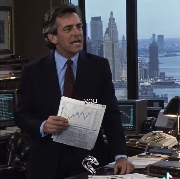 A man in a suit stands in an office with a city skyline view, holding a paper with a declining chart labeled 'you' and a snake graphic.