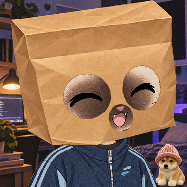 A person wearing a dark blue Adidas track jacket has a brown paper bag with drawn-on smiling closed eyes and an open mouth over their head, appearing to be in a room with a computer setup.
