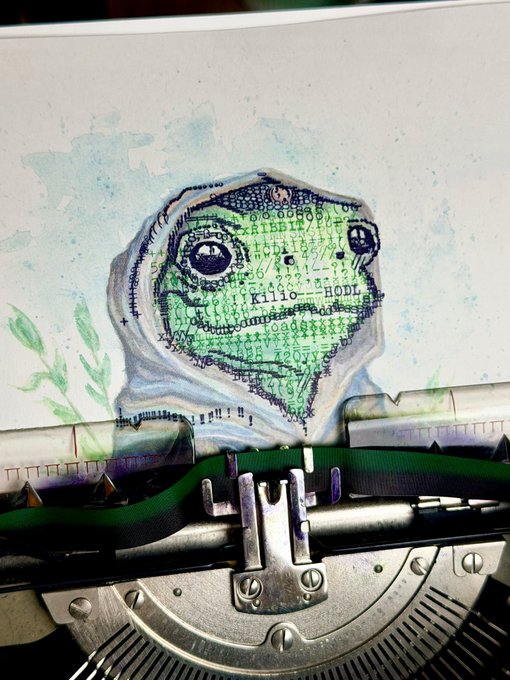 A typewriter printing a green alien-like creature illustration using characters and symbols as the artwork's medium, with visible typewriter mechanics including ribbon and keys.