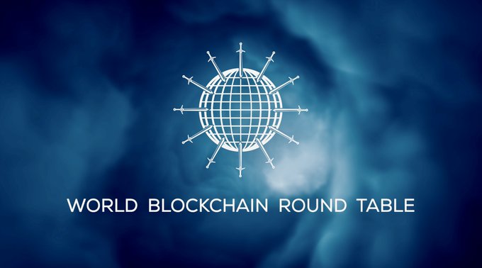 A graphic logo for 'WORLD BLOCKCHAIN ROUND TABLE' displaying a white globe with radiating arrows set against a deep blue cloudy background.