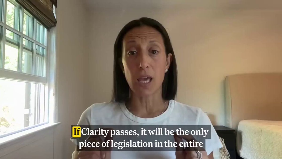 The image features a woman wearing a white shirt with black text that reads "IF CLARITY PASSES, IT WILL BE THE ONLY PIECE OF LAW IN THE ENTIRE WORLD THAT TOUCHES DEFI!". The woman is standing in front of a window and appears to be giving a speech or presentation.

The image also includes the caption "GENERAL COUNSEL OF AAVE COMPANIES, REBECCA RETTIG, SAYS: IF CLARITY PASSES, IT WILL BE THE ONLY PIECE OF LAW IN THE ENTIRE WORLD THAT TOUCHES DEFI!". This statement is related to the content of the image and reinforces the idea that clarity is essential in matters of law.