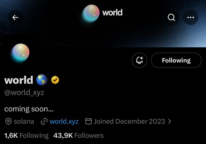 This is a screenshot of the Twitter profile for "@world_xyz" with their domain "world.xyz" and a note that they are "coming soon..." on the Solana blockchain. The humorous accompanying post suggests they have secured IP rights for the entire "WORLD".
