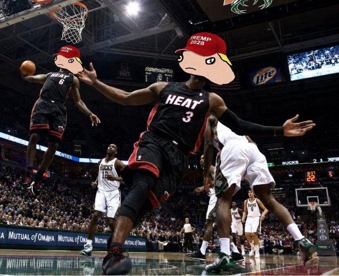 An edited NBA basketball action photo showing Miami Heat players wearing hats labeled 'TRUMP 2026' with cartoon-style faces over their heads during a game.