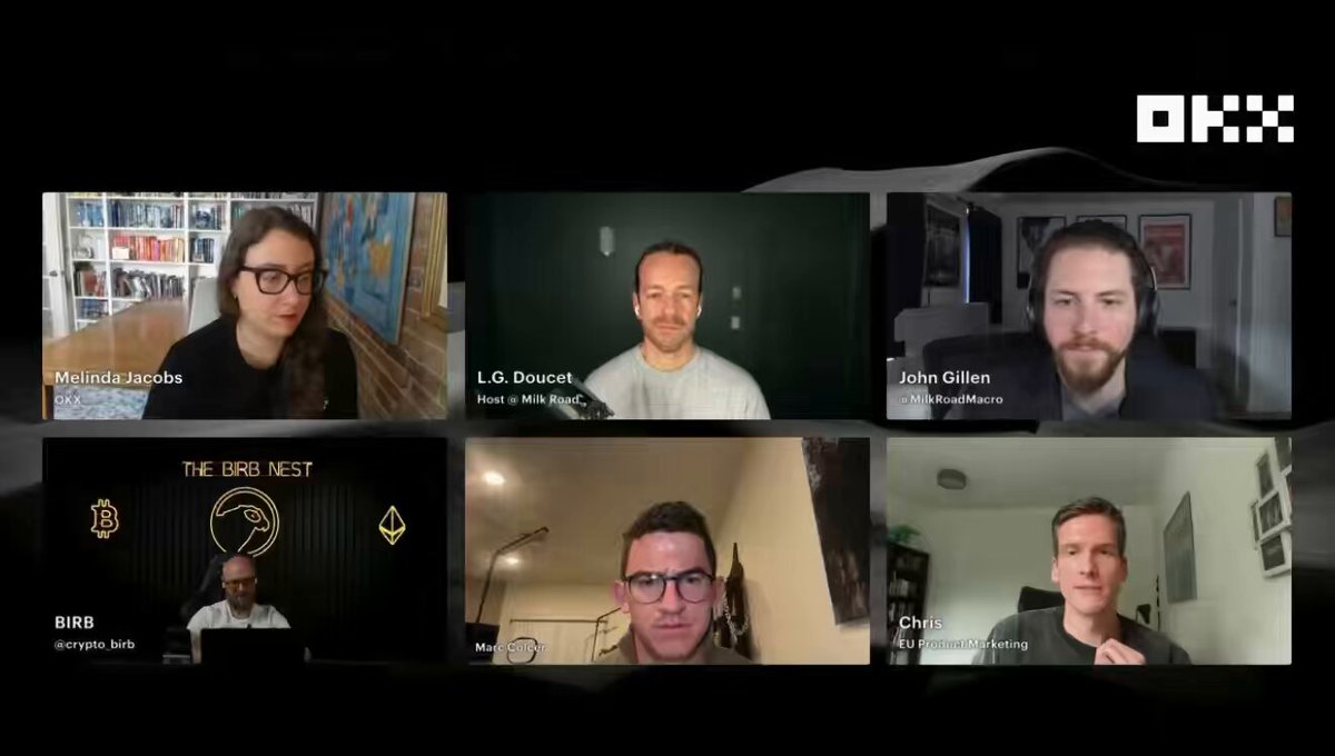 In this image, there are six people looking at a computer screen that says "Space X going public is the market event we've all been waiting for. Want to trade the price action? OKX is your destination for SPCX exposure through X-Perps. Don't get left behind." The scene appears to be a video conference, with each person's face appearing in their own small square on the screen. One of them seems to have a laptop open next to his head, suggesting they might be presenting or discussing something related to space exploration.
