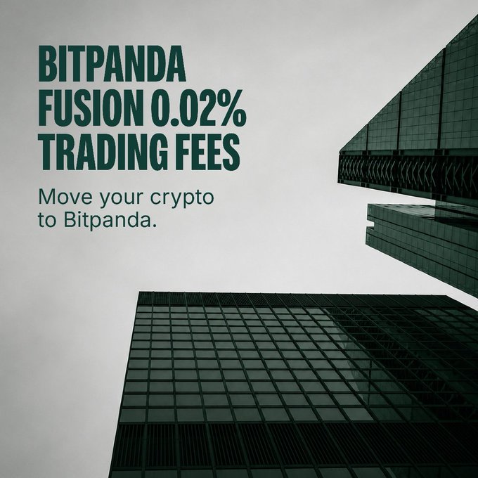 An advertisement featuring dark green-tinted skyscrapers against a gray sky, with bold text reading "BITPANDA FUSION 0.02% TRADING FEES" and the tagline "Move your crypto to Bitpanda." The image promotes Bitpanda's low trading fees and Bring Your Assets campaign, visually reinforcing the message of transferring crypto to the platform.